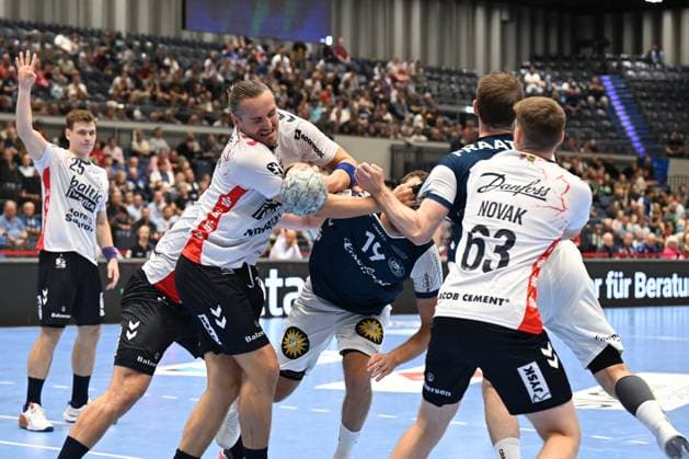 DAIKIN 1 Handball Bundesliga 25 26 5 Matchday Bergischer HC SG Flensburg Handewitt on 21 09 2025 at the Mitsubishi Electric Halle in Düsseldorf Kent Robin Tonnesen 23 SG Flensburg Handewitt and Domen Novak 63 SG Flensburg Handewitt stop Tomas Babak 19 Bergischer HC WD