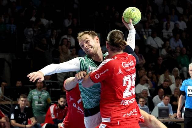 DEU, DHB, 1 HBL, Fuechse Berlin vs Melsungen, 21 09 2025, Max Schmeling Halle, Berlin, DEU, DHB, 1 HBL, Fuechse Berlin vs Melsungen, in the picture Mathias Gidsel Fuechse Berlin 19 , Olle Forsell Schefvert MT Melsungen 25 nordphotoxGmbHx xEngler nph00076