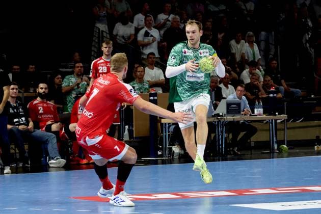 DEU, DHB, 1 HBL, Fuechse Berlin vs Melsungen, 21 09 2025, Max Schmeling Halle, Berlin, DEU, DHB, 1 HBL, Fuechse Berlin vs Melsungen, in the picture Mathias Gidsel Fuechse Berlin 19 , David Mandic MT Melsungen 7 nordphotoxGmbHx xEngler nph00076