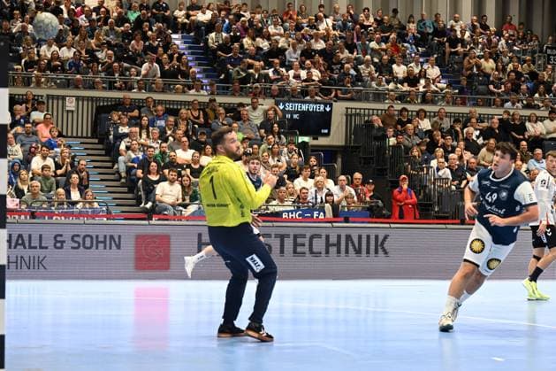 DAIKIN 1 Handball Bundesliga 25 26 5 Matchday Bergischer HC SG Flensburg Handewitt on 21 09 2025 at the Mitsubishi Electric Halle in Düsseldorf Parade of goalkeeper Benjamin BuriÄ‡ 1 SG Flensburg Handewitt against Aron Seesing 49 Bergischer HC WD