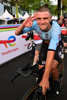 Belgian Remco Evenepoel celebrates and shows the number of his victories, three on a row, at the arrival of the Men Elite Individual Time Trial race (40,8km) at the cycling road world championships, in Kigali, Rwanda, Sunday 21 September 2025. The 2025 UCI Road World Championships take place from 21 to 28 September in Kigali, Rwanda. DIRKxWAEM  x134916527x