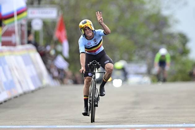 Belgian Remco Evenepoel celebrates and shows the number of his victories, three, at the arrival of the Men Elite Individual Time Trial race (40,8km) at the cycling road world championships, in Kigali, Rwanda, Sunday 21 September 2025. The 2025 UCI Road World Championships take place from 21 to 28 September in Kigali, Rwanda. DIRKxWAEM  x134918099x