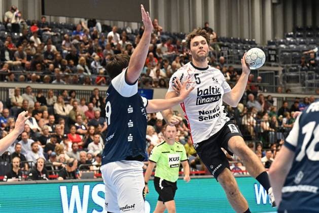 DAIKIN 1 Handball Bundesliga 25 26 5 Matchday Bergischer HC SG Flensburg Handewitt on 21 09 2025 at the Mitsubishi Electric Halle in Düsseldorf Tomas Babak 19 Bergischer HC vs Niclas Kirkelokke 5 SG Flensburg Handewitt WD