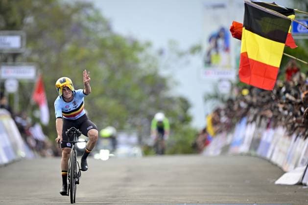 Belgian Remco Evenepoel celebrates and shows the number of his victories, three, at the arrival of the Men Elite Individual Time Trial race (40,8km) at the cycling road world championships, in Kigali, Rwanda, Sunday 21 September 2025. The 2025 UCI Road World Championships take place from 21 to 28 September in Kigali, Rwanda. DIRKxWAEM  x134929143x