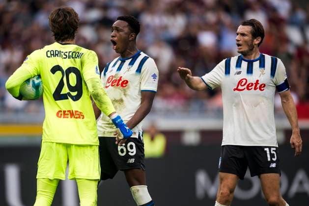 Torino FC v Atalanta BC - Serie A Marco Carnesecchi of Atalanta BC celebrates with Honest Ahanor and Marten de Roon of Atalanta BC after saving a penalty kick during the Serie A football match between Torino FC and Atalanta BC. Turin Italy Copyright: xNicolòxCampox