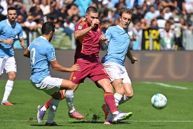 CALCIO - Serie A - SS Lazio vs AS Roma Pedro Rodriguez of SS Lazio,Evan Ferguson of AS Roma,Nicolo Rovella of SS Lazio during the serie A Enilive match between SS Lazio v Roma at olimpico stadium in Rome September 21st, 2025 Mattia Vian Rome Italy  Copyright: xIPAxSport ABACAx