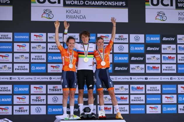 (250922) -- KIGALI, Sept. 22, 2025 -- Gold medalist Marlen Reusser (C) of Switzerland, silver medalist Anna van der Breggen (L) of the Netherlands and bronze medalist Demi Vollering of the Netherlands pose during the awarding ceremony for the Women s Elite Individual Time Trial of the 2025 UCI Road World Championships in Kigali, Rwanda, on Sept. 21, 2025. (Photo by Xinhua) (SP)RWANDA-KIGALI-CYCLING-UCI-ROAD WORLD CHAMPIONSHIPS-WOMEN S ELITE HuangxWanqing 