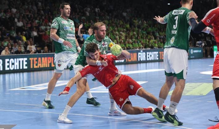 Max Darj in a duel with Nikolaj Enderleit Action Match scene Sport Handball HBL Bundesliga Men 5 Matchday Season 2025 2026 21 09 2025 Füchse Berlin vs MT Melsungen