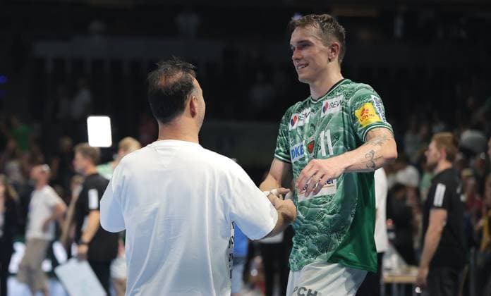 Manager Bob Hanning high-fives with Lasse Andersson Upper body action Sport Handball HBL Bundesliga Men 5 Matchday Season 2025 2026 21 09 2025 Füchse Berlin vs MT Melsungen