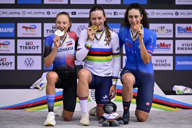 Slovak Viktoria Chladonova, British Zoe Backstedt and Italian Federica Venturelli celebrate on the podium of the Women U23 Individual Time Trial race (22,6km) at the cycling road world championships, in Kigali, Rwanda, Monday 22 September 2025. The 2025 UCI Road World Championships take place from 21 to 28 September in Kigali, Rwanda. DIRKxWAEM  x134990918x