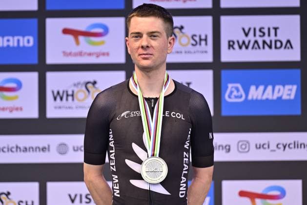 New Zealander Nate Pringle celebrates on the podium with the silver medal, after the Men U23 Individual Time Trial race (31,2km) at the cycling road world championships, in Kigali, Rwanda, Monday 22 September 2025. The 2025 UCI Road World Championships take place from 21 to 28 September in Kigali, Rwanda. DIRKxWAEM  x135009546x