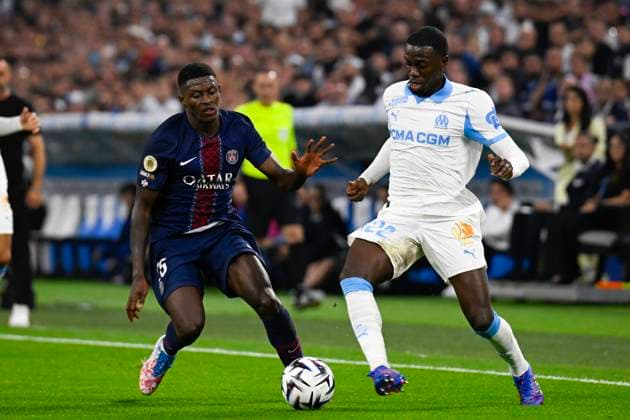 FOOTBALL : Olympique de Marseille VS Paris Saint Germain - Ligue 1 McDonald s - 22 09 2025 Nuno Mendes (PSG) Timothy Weah (OM) - Ligue 1 Mcdonald s match between Olympique de Marseille and Paris Saint Germain on September 22, 2025 at the Orange Velodrome Stadium in Marseille. MarseilleFrance  Copyright: xWilliamxCannarellax