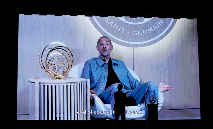 (250923) -- PARIS, Sept. 23, 2025 -- Paris Saint-Germain s Spanish head coach Luis Enrique is seen on screen as he gives a speech after receiving the Johan Cruyff Best Mens Club team s Head Coach during the 2025 Ballon d Or France Football award ceremony at the Theatre du Chatelet in Paris, France, on Sept. 22, 2025. ) (SP)FRANCE-PARIS-FOOTBALL-BALLON D OR CEREMONY GaoxJing 