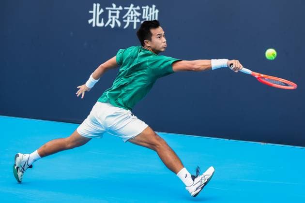 BEIJING, CHINA - SEPTEMBER 23: Sun Fajing of China competes in the Men s Singles Qualifying first round match against Terence Atmane of France on day 2 of the 2025 China Open at National Tennis Center on September 23, 2025 in Beijing, China.  Copyright: xVCGx 111592710219