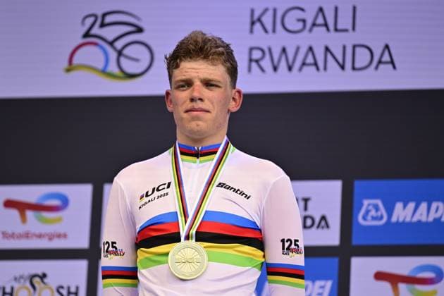 Dutch Michiel Mouris celebrates on the podium after winning the Men Junior Individual Time Trial race (22,6km) at the cycling road world championships, in Kigali, Rwanda, Tuesday 23 September 2025. The 2025 UCI Road World Championships take place from 21 to 28 September in Kigali, Rwanda. DIRKxWAEM  x135080930x