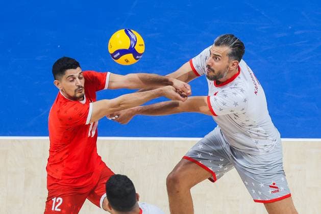 (250923) -- PASAY CITY, Sept. 23, 2025 -- Mohamed Ridene (L) and Elyes Karamosli (R) of Tunisia compete during the round of 16 match between the Czech Republic and Tunisia at the FIVB Men s World Championship, WM, Weltmeisterschaft 2025 in Pasay City, the Philippines, Sept. 23, 2025. ) (SP)PHILIPPINES-PASAY CITY-VOLLEYBALL-FIVB MEN S WORLD CHAMPIONSHIP 2025-TUN VS CZE ROUELLExUMALI 