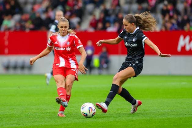 Georgia Stanway 31, FC Bayern Munich and Maj Schneider 15, SC Freiburg at the match between FC Bayern Munich v SC Freiburg, Football, Women, Google Pixel Women Bundesliga, 2025 2026, Matchday 4 on 23 09 2025 in Munich, FC Bayern Campus DFL and DFB regulations prohibit any use of photographs as image sequences and or quasi video Bayern Germany