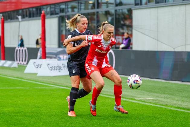 Georgia Stanway 31, FC Bayern Munich and Lisa Karl 2, SC Freiburg at the match between FC Bayern Munich v SC Freiburg, Football, Women, Google Pixel Women Bundesliga, 2025 2026, Matchday 4 on 23 09 2025 in Munich, FC Bayern Campus DFL and DFB regulations prohibit any use of photographs as image sequences and or quasi video Bayern Germany