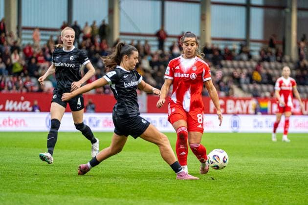 Selina Vobian 10 Freiburg and Lena Oberdorf 8 Bayern in action at the Google Pixel Womens Bundesliga match FC Bayern Munich SC Freiburg on 23 09 2025 Munich FC Bayern Campus Bayern Germany