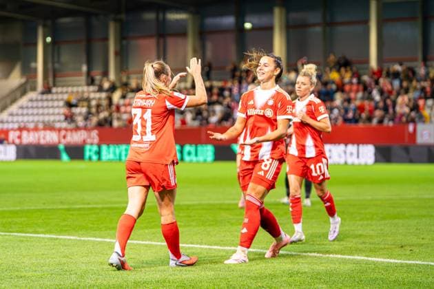 Georgia Stanway 31 FC Bayern and Lena Oberdorf 8 Bayern celebrate the 2-0 goal at the Google Pixel Womens Bundesliga match FC Bayern Munich SC Freiburg on 23 09 2025 Munich FC Bayern Campus Germany