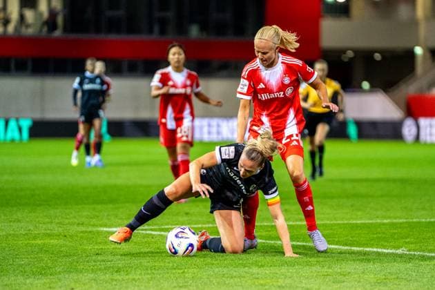 Lisa Karl 2 Freiburg and Pernille Harder 21 Bayern in action at the Google Pixel Womens Bundesliga match FC Bayern Munich SC Freiburg on 23 09 2025 Munich FC Bayern Campus Bayern Germany