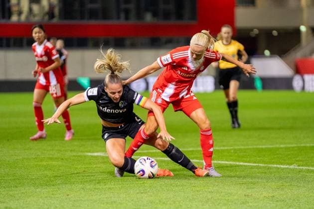 Lisa Karl 2 Freiburg and Pernille Harder 21 Bayern in action at the Google Pixel Womens Bundesliga match FC Bayern Munich SC Freiburg on 23 09 2025 Munich FC Bayern Campus Bayern Germany