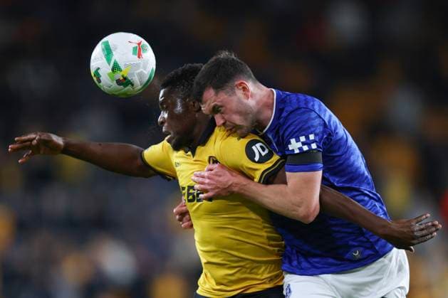 Wolverhampton, England, 23rd September 2025. Marshall Munetsi of Wolverhampton Wanderers and Michael Keane of Everton during the Wolverhampton Wanderers vs Everton Carabao Cup match at Molineux, Wolverhampton. Picture credit should read: James Baylis Sportimage EDITORIAL USE ONLY. No use with unauthorised audio, video, data, fixture lists, club league logos or live services. Online in-match use limited to 120 images, no video emulation. No use in betting, games or single club league player publications. SPI_11_JB_WOL_EVE SPI-4157-0011