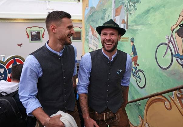 Football, Men, 3 Liga, Season 2025 2026, TSV 1860 Munich, official Oktoberfest visit, Hacker Festzelt Maximilian Wolfram TSV 1860 Munich left with Patrick Hobsch TSV 1860 Munich right in traditional costume on the stairs to the gallery