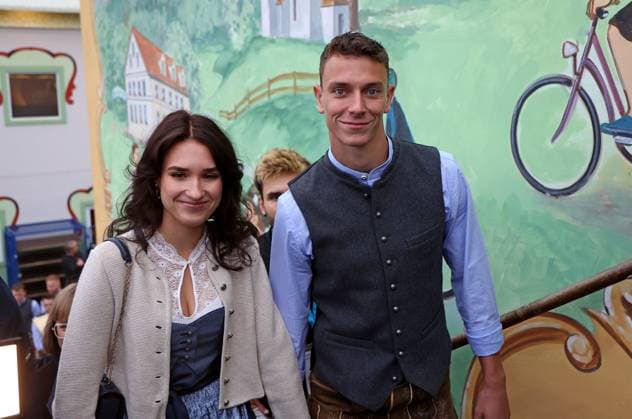 Football, Men, 3 Liga, Season 2025 2026, TSV 1860 Munich, official Oktoberfest visit, Hacker Festzelt Manuel Pfeifer TSV 1860 Munich with companion in traditional costume on the stairs to the gallery
