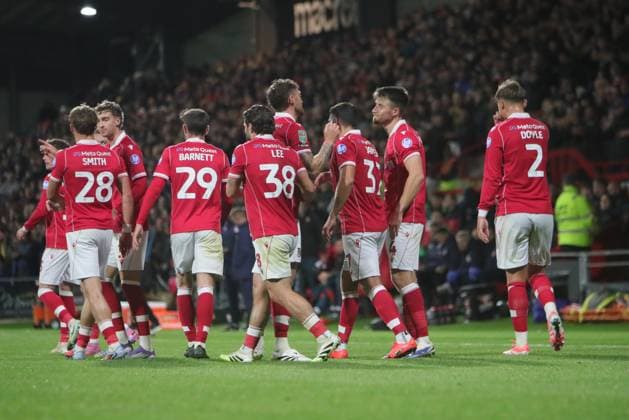 Wrexham FC v Reading EFL Cup 23 09 2025. Wrexham players celebrate Nathan Broadhead of Wrexham scoring their first goal during the EFL Cup match between Wrexham FC and Reading at the Racecourse Ground, Wrexham, United Kingdom on 23 September 2025. Wrexham Racecourse Ground Wales United Kingdom Editorial use only DataCo restrictions apply See www.football-dataco.com , Copyright: xAlunxRobertsx PSI-22905-0021