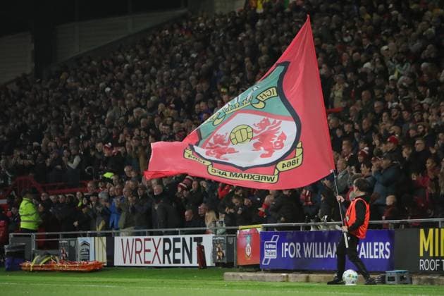 Wrexham FC v Reading EFL Cup 23 09 2025. Wrexham banner after goal during the EFL Cup match between Wrexham FC and Reading at the Racecourse Ground, Wrexham, United Kingdom on 23 September 2025. Wrexham Racecourse Ground Wales United Kingdom Editorial use only DataCo restrictions apply See www.football-dataco.com , Copyright: xAlunxRobertsx PSI-22905-0022
