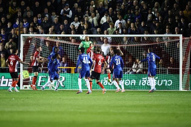 Lincoln City v Chelsea EFL Cup 23 09 2025. Chelsea goalkeeper Filip Jorgensen (12) collects a cross during the EFL Cup match between Lincoln City and Chelsea at Sincil Bank, Lincoln, United Kingdom on 23 September 2025. Lincoln Sincil Bank Lincs United Kingdom Editorial use only DataCo restrictions apply See www.football-dataco.com , Copyright: xJohnxMallettx PSI-22888-0057