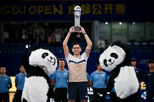 CHENGDU, CHINA - SEPTEMBER 23: Alejandro Tabilo of Chile celebrates with champion trophy after winning the Men s Singles final match against Lorenzo Musetti of Italy on Day 8 of 2025 ATP, Tennis Herren Chengdu Open at Sichuan International Tennis Centre on September 23, 2025 in Chengdu, Sichuan Province of China.  Copyright: xVCGx 111592815186