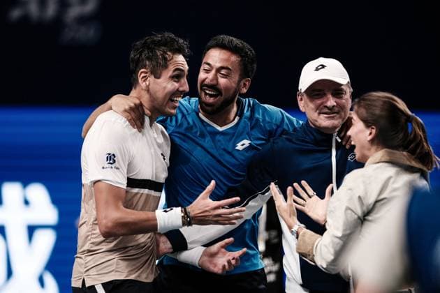 CHENGDU, CHINA - SEPTEMBER 23: Alejandro Tabilo (L) of Chile celebrates after winning the Men s Singles final match against Lorenzo Musetti of Italy on Day 8 of 2025 ATP, Tennis Herren Chengdu Open at Sichuan International Tennis Centre on September 23, 2025 in Chengdu, Sichuan Province of China.  Copyright: xVCGx 111592811759