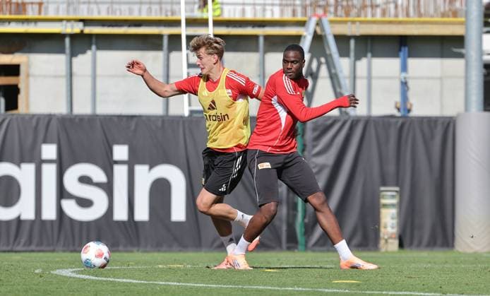 Aljoscha Kemlein, Ilyas Ansah duel match scene action sport football soccer training 1 Bundesliga men DFL season 2025 2026 24 09 2025 1 FC Union Berlin FCU DFL regulations prohibit any use of photographs as image sequences and or quasi video