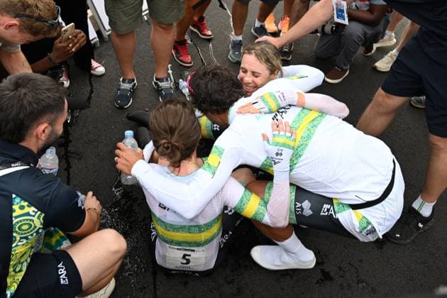 Australian Michael Matthews celebrates with his teammates after winning the Team Time Trial Mixed Relay race (41,8km) at the cycling road world championships, in Kigali, Rwanda, Wednesday 24 September 2025. The 2025 UCI Road World Championships take place from 21 to 28 September in Kigali, Rwanda. DIRKxWAEM  x135168465x