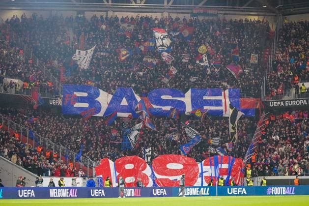 Football UEFA Europa League 2025 26, 1 matchday SC Freiburg vs FC Basel Europa Park Stadion Freiburg FC Basel fans with big choreography BASEL 1893, flags and banners, impressive atmosphere in the guest block, fan culture, UEFA competition, emotional support, security forces on the sidelines Freiburg im Breisgau Baden Württemberg Germany Copyright: xJOERANxSTEINSIEKx