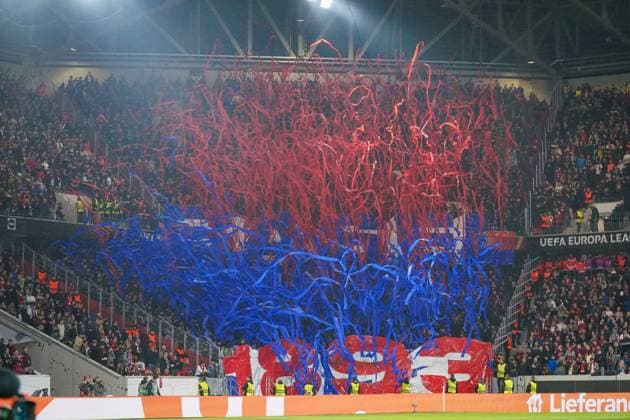 Football UEFA Europa League 2025 26, Matchday 1 SC Freiburg vs FC Basel Europa Park Stadion Freiburg Choreography of FC Basel fans with red and blue streamers, impressive fan staging in the guest block, colorful support, UEFA competition, emotions and fan culture, security forces on the sidelines Freiburg im Breisgau Baden Württemberg Germany Copyright: xJOERANxSTEINSIEKx