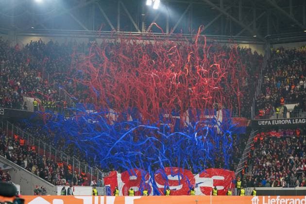 Football UEFA Europa League 2025 26, Matchday 1 SC Freiburg vs FC Basel Europa Park Stadion Freiburg Choreography of FC Basel fans with red and blue streamers, impressive fan staging in the guest block, colorful support, UEFA competition, emotions and fan culture, security forces on the sidelines Freiburg im Breisgau Baden Württemberg Germany Copyright: xJOERANxSTEINSIEKx