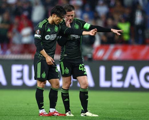 Reo Hatate and Callum McGregor of Celtic Crvena zvezda v Celtic, UEFA Europa League, Football, Rajko Mitic Stadium, Belgrade, Serbia - 24 Sep 2025Belgrade Rajko Mitic Stadium Serbia EDITORIAL USE ONLY No use with unauthorised audio, video, data, fixture lists, club league logos or live services. Online in-match use limited to 120 images, no video emulation. No use in betting, games or single club league player publications. Copyright: xNikolaxKrstic Shutterstockx 15498417cl