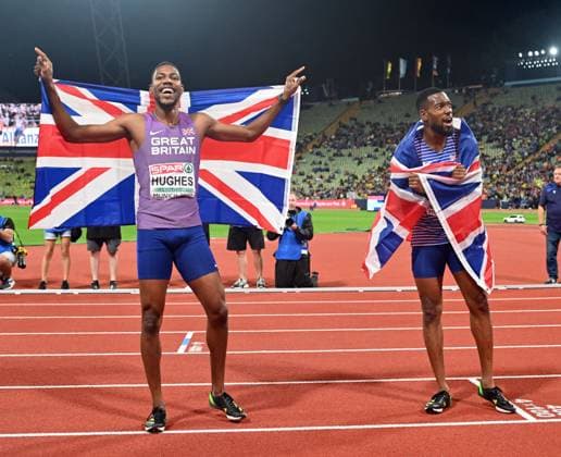 European Athletics Championships Munich 2022, Day 5 MUNICH, GERMANY - AUGUST 19: Gold medalist Zharnel Hughes (L) of Great Britain and Silver medalist Nethaneel Mitchell-Blake (R) of Great Britain pose after the Athletics - Men s 200m Final during the European Championships Munich 2022 at Olympic Stadium in Munich, Germany on August 19, 2022. Bayern Germany. Editorial use only. Please get in touch for any other usage.  Copyright: x2025xAnadoluxMustafaxYalcÄ±nx