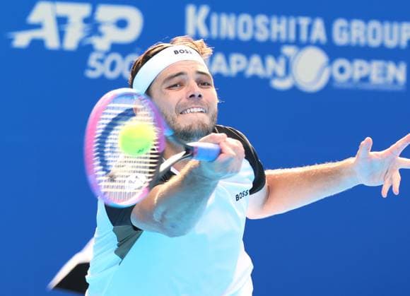 September 25, 2025, Tokyo, Japan - Taylor Fritz of the United States returns the ball against Canada s Gabriel Diallo during single round 32 at the the Japan Open Tennis tournament in Tokyo on Thursday, September 25, 2025. Fritz defeated Diallo 4-6, 6-3, 7-6. (photo by Yoshio Tsunoda AFLO) Noxthirdxpartyxsales  aflo_304714334