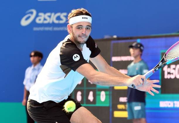 September 25, 2025, Tokyo, Japan - Taylor Fritz of the United States returns the ball against Canada s Gabriel Diallo during single round 32 at the the Japan Open Tennis tournament in Tokyo on Thursday, September 25, 2025. Fritz defeated Diallo 4-6, 6-3, 7-6. (photo by Yoshio Tsunoda AFLO) Noxthirdxpartyxsales  aflo_304714335
