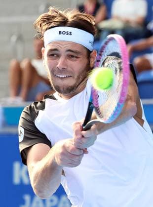 September 25, 2025, Tokyo, Japan - Taylor Fritz of the United States returns the ball against Canada s Gabriel Diallo during single round 32 at the the Japan Open Tennis tournament in Tokyo on Thursday, September 25, 2025. Fritz defeated Diallo 4-6, 6-3, 7-6. (photo by Yoshio Tsunoda AFLO) Noxthirdxpartyxsales  aflo_304714340