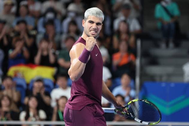 September 25, 2025, Tokyo, Japan - Carlos Alcaraz of Spain clinches his fist as he won a key point against Sebastian Baez of Argentina during a single round 32 match at the the Japan Open Tennis tournament in Tokyo on Thursday, September 25, 2025. Alcaraz defeated Baez 6-4, 6-2. (photo by Yoshio Tsunoda AFLO) Noxthirdxpartyxsales  aflo_304734373