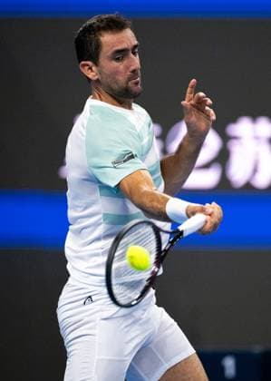 (250925) -- BEIJING, Sept. 25, 2025 -- Marin Cilic hits a return during the men s singles first round match between Jannik Sinner of Italy and Marin Cilic of Croatia at 2025 China Open tennis tournament in Beijing, China, Sept. 25, 2025. ) (SP)CHINA-BEIJING-TENNIS-CHINA OPEN-MEN S SINGLES-FIRST ROUND (CN) HuxJingwen 