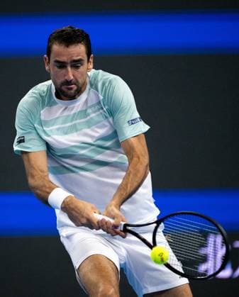 (250925) -- BEIJING, Sept. 25, 2025 -- Marin Cilic hits a return during the men s singles first round match between Jannik Sinner of Italy and Marin Cilic of Croatia at 2025 China Open tennis tournament in Beijing, China, Sept. 25, 2025. ) (SP)CHINA-BEIJING-TENNIS-CHINA OPEN-MEN S SINGLES-FIRST ROUND (CN) HuxJingwen 