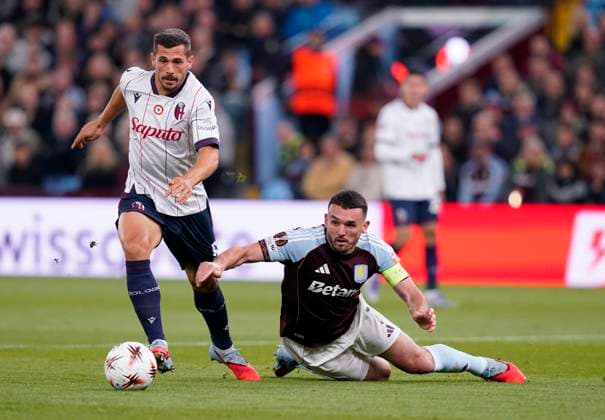 Birmingham, England, 25th September 2025. John McGinn of Aston Villa (r) dispossessed of the ball by Remo Freuler of Bologna (l) during the Aston Villa vs Bologna UEFA Europa League match at Villa Park, Birmingham. Picture credit should read: Andrew Yates Sportimage EDITORIAL USE ONLY. No use with unauthorised audio, video, data, fixture lists, club league logos or live services. Online in-match use limited to 120 images, no video emulation. No use in betting, games or single club league player publications. SPI_003_AY_Villa_Bologna SPI-4162-0004