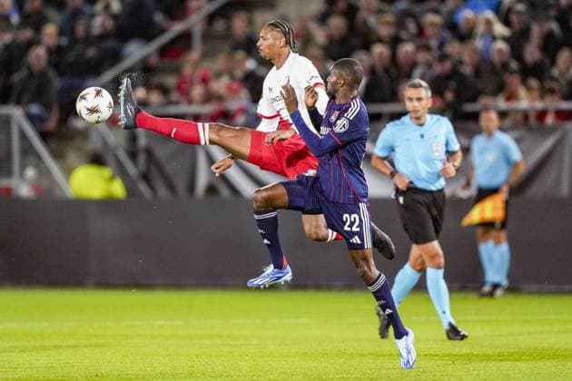UTRECHT , 25-09-2025 , stadium Galgenwaard , season 2025 2026 , UEFA Europa League football , League phase Matchday 1 , match between FC Utrecht and Olympique Lyon , picture shows FC Utrecht player Sebastien Haller and Olympique Lyonnais player Clinton Mata Utrecht - Olympique Lyon  x31193697x Copyright: