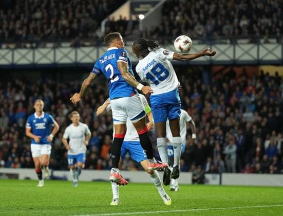 The ball strikes the right arm of Joris Kayembe of Genk from a header at goal by Rangers captain James Tavernier inside the Genk penalty area. Rangers v Genk, UEFA Europa League, Football, Ibrox Stadium, Glasgow, Scotland, UK - 25 Sep 2025Glasgow Ibrox Stadium Scotland United Kingdom EDITORIAL USE ONLY No use with unauthorised audio, video, data, fixture lists, club league logos or live services. Online in-match use limited to 120 images, no video emulation. No use in betting, games or single club league player publications. Copyright: xStuartxWallace Shutterstockx 15498613al